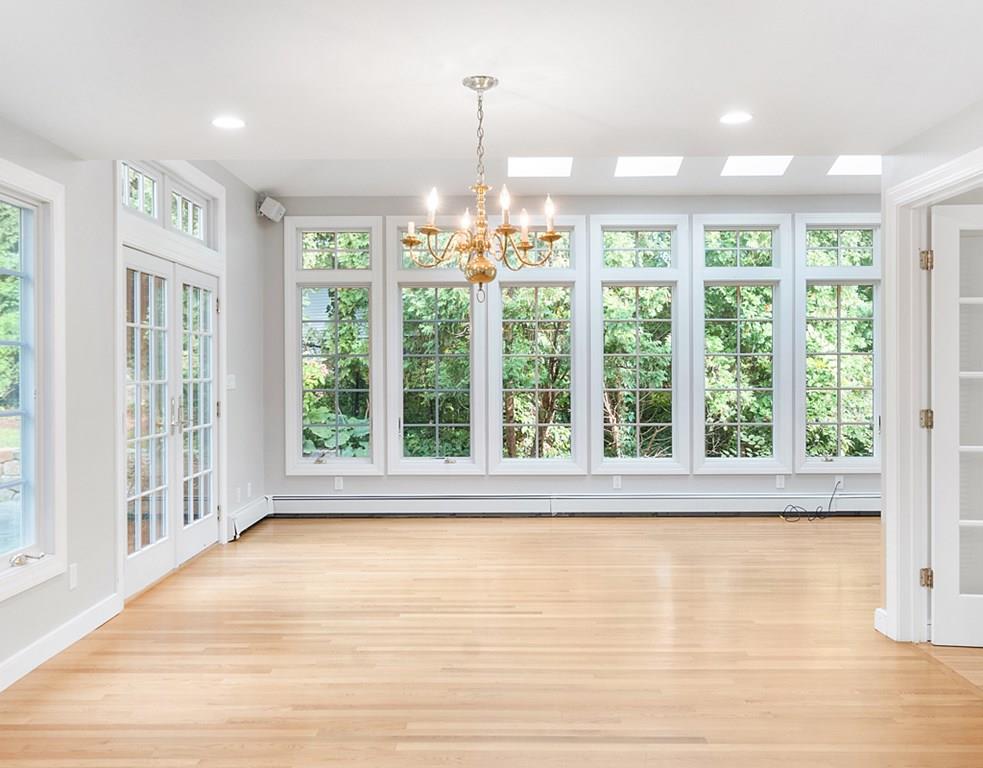 9 Northgate Road Wellesley, MA 02481 - Photo 4 of 32 a view of a room with large windows