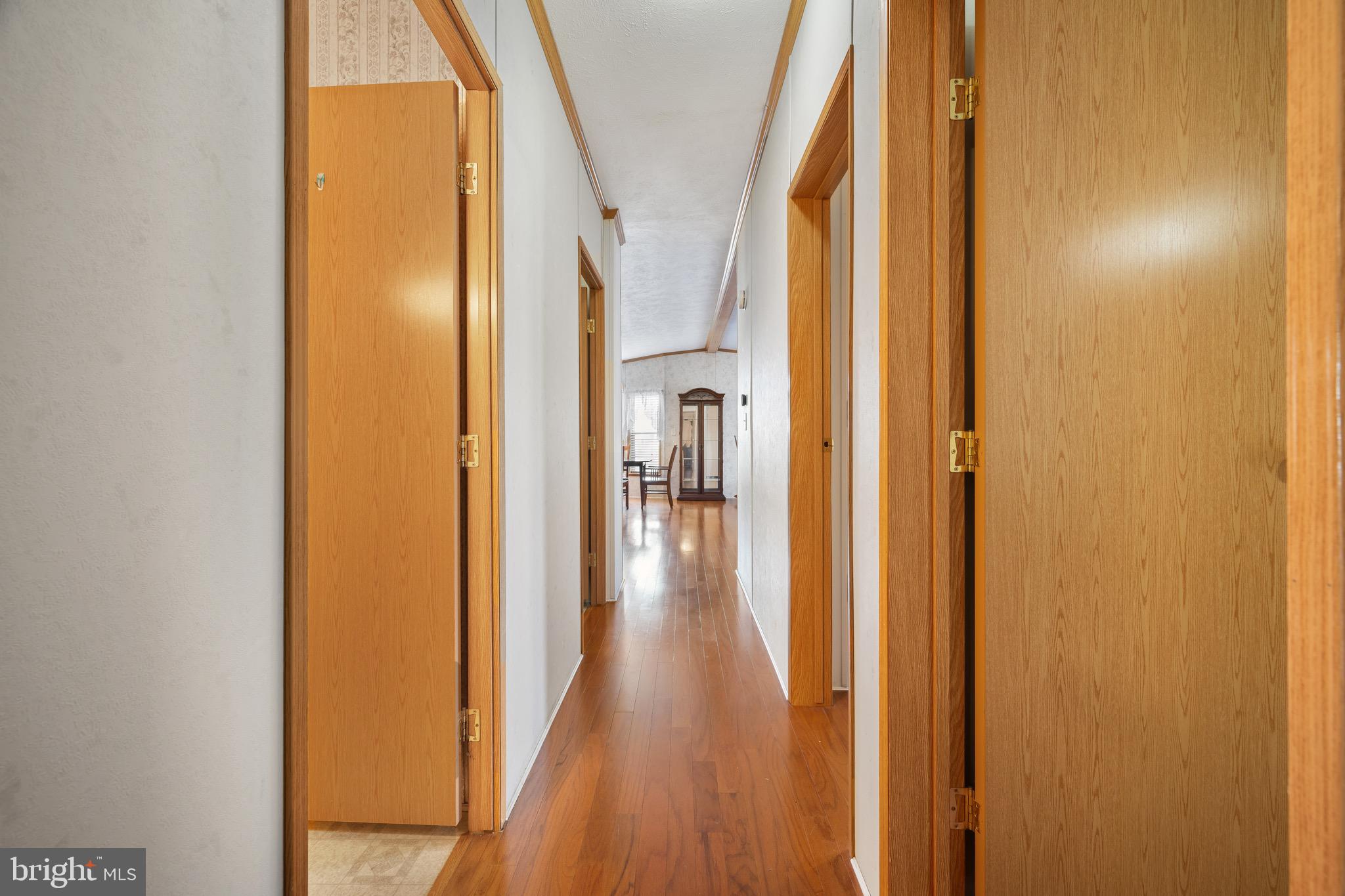 29 Oak Drive, Unit D Sicklerville, NJ 08081 - Photo 20 of 23 a view of a hallway with wooden floor and staircase