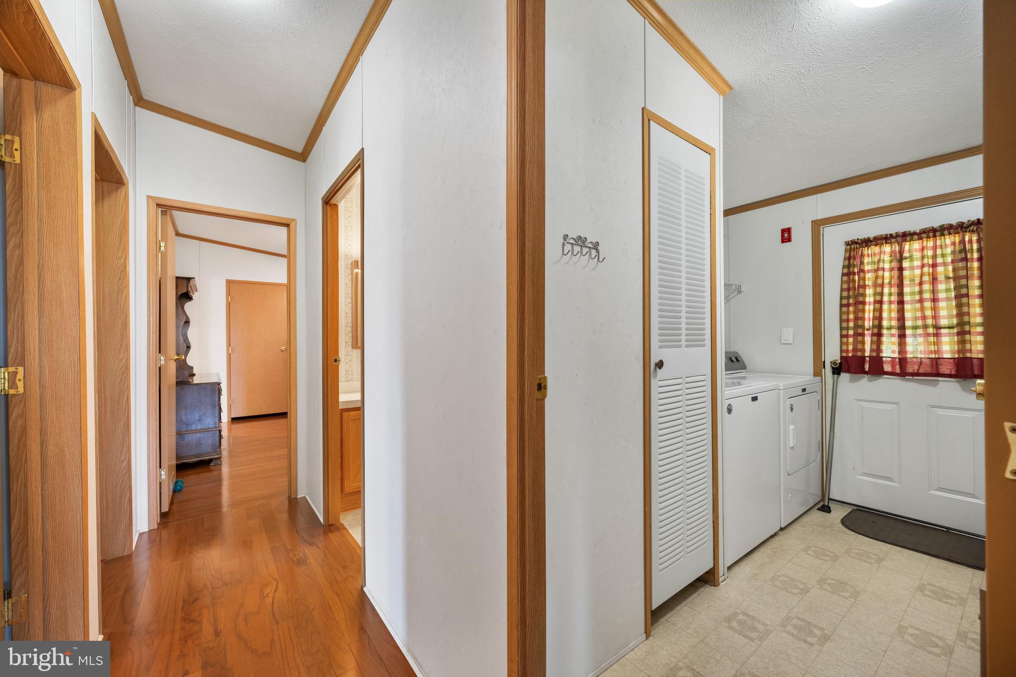 29 Oak Drive, Unit D Sicklerville, NJ 08081 - Photo 23 of 23 a view of a hallway with a wooden door