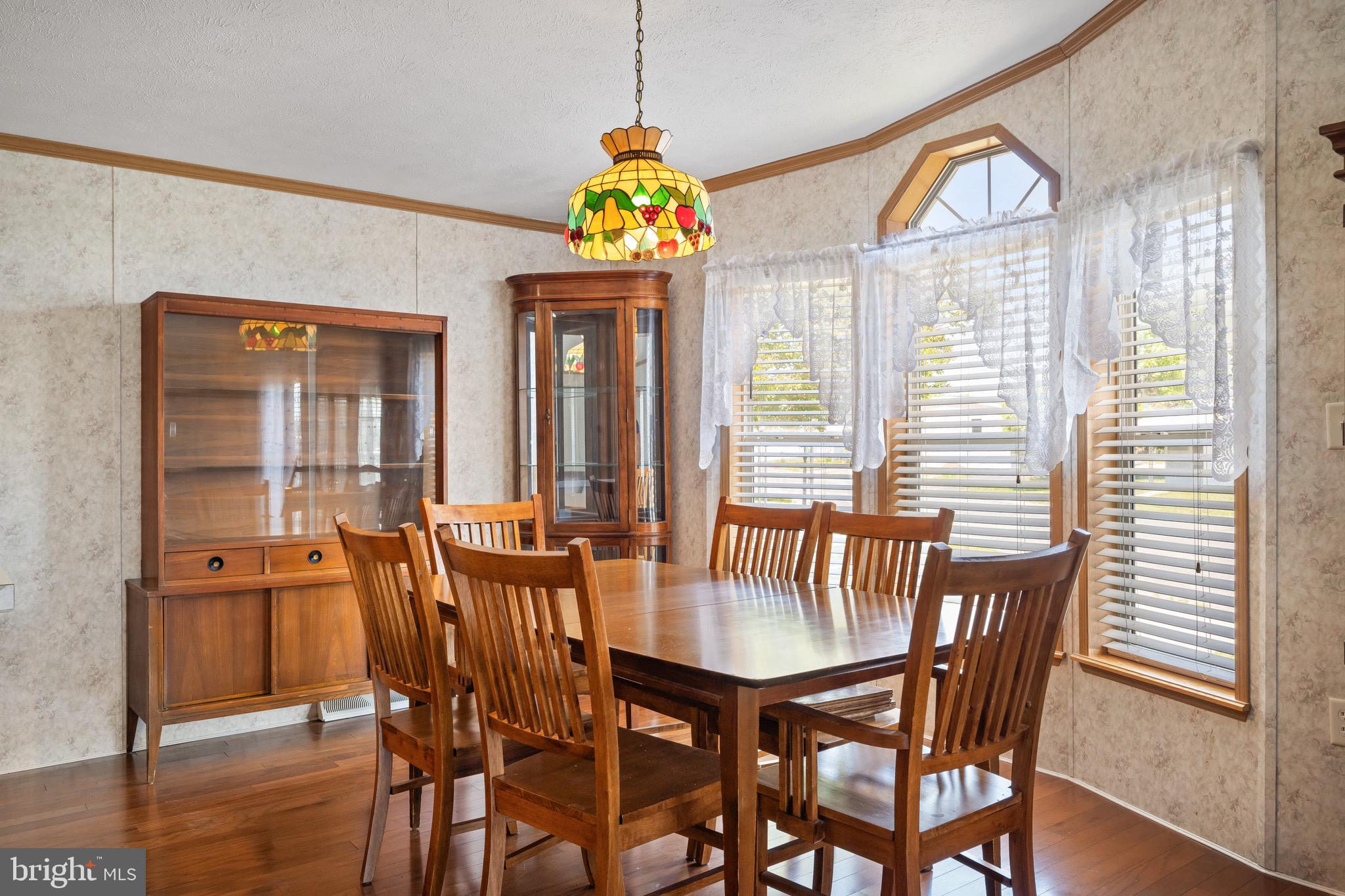 29 Oak Drive, Unit D Sicklerville, NJ 08081 - Photo 9 of 23 a view of a dining room with furniture window and wooden floor