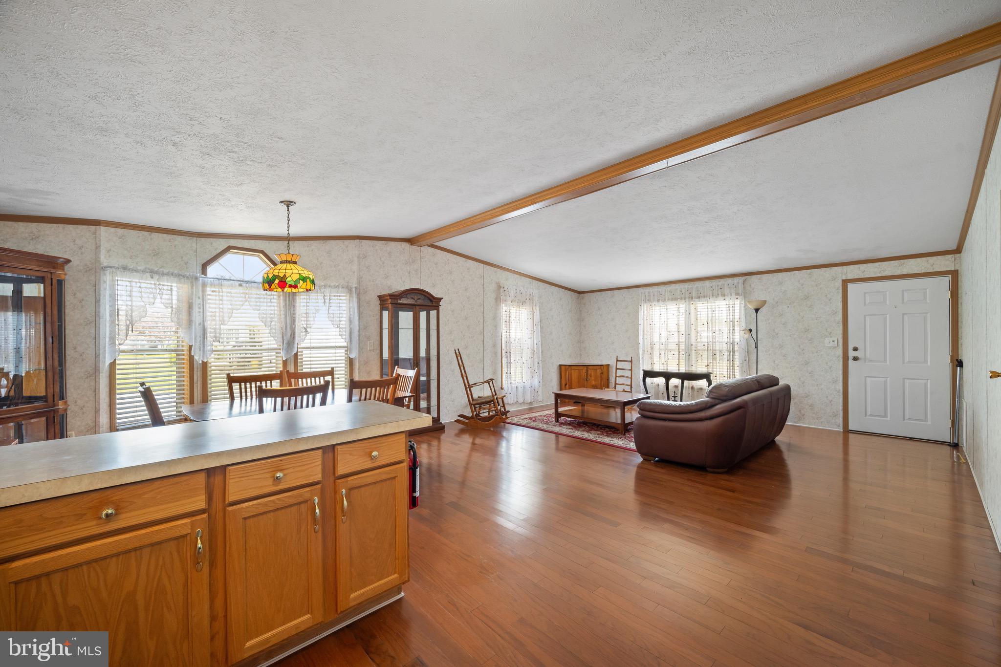 29 Oak Drive, Unit D Sicklerville, NJ 08081 - Photo 10 of 23 a living room with furniture and wooden floor