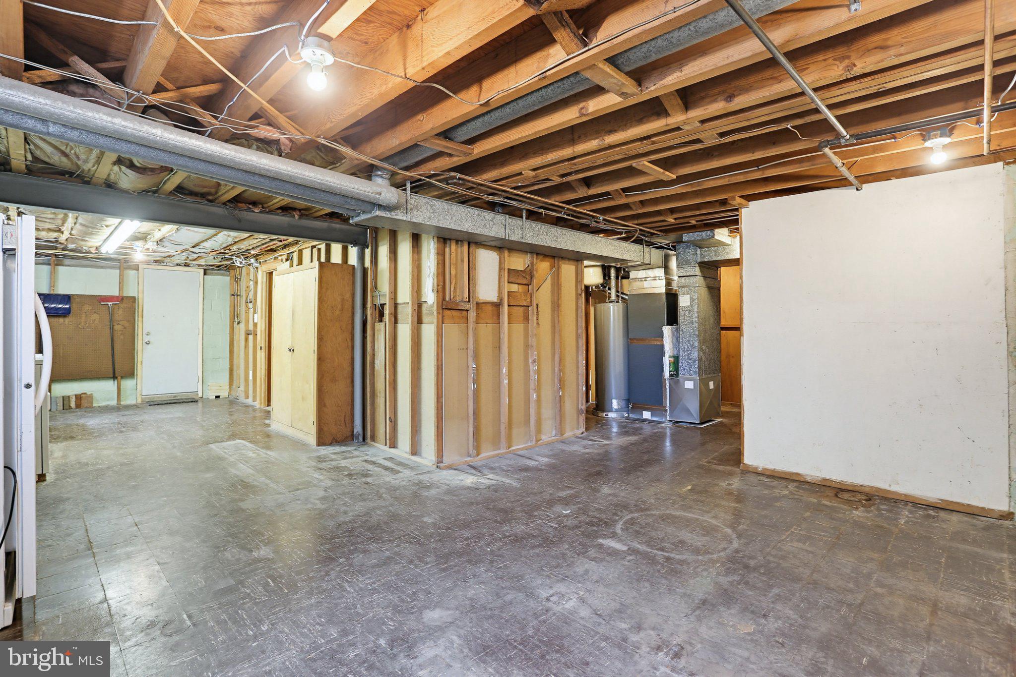 8145 Scotts Level Road Pikesville, MD 21208 - Photo 34 of 45 Spacious unfinished basement ready for ideas.