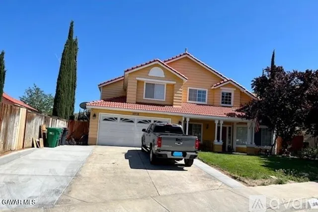 a house view with a outdoor space