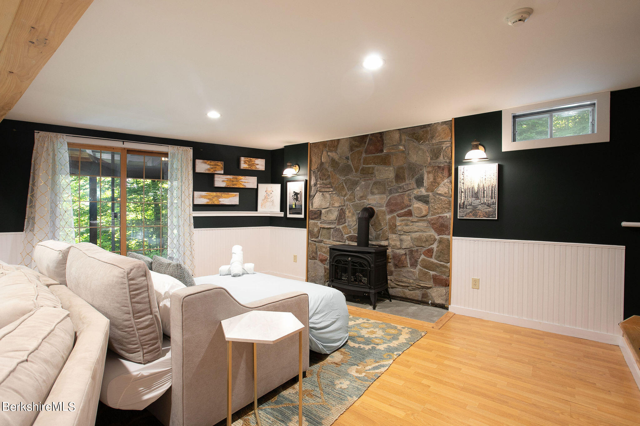 83 Main Road Monterey, MA 01230 - Photo 32 of 49 a bedroom with a bed and wooden floor