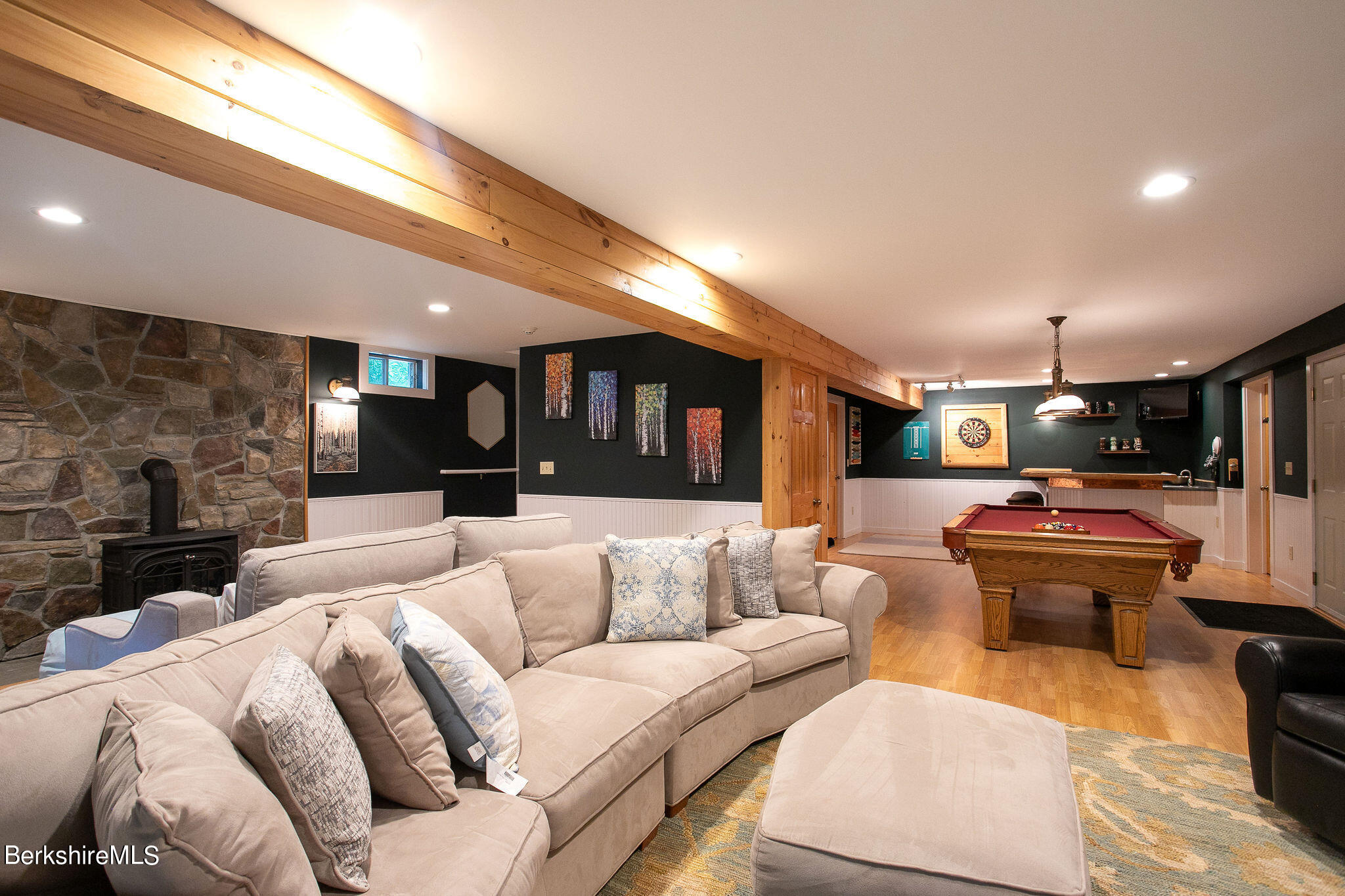 83 Main Road Monterey, MA 01230 - Photo 35 of 49 a living room with furniture and a fireplace