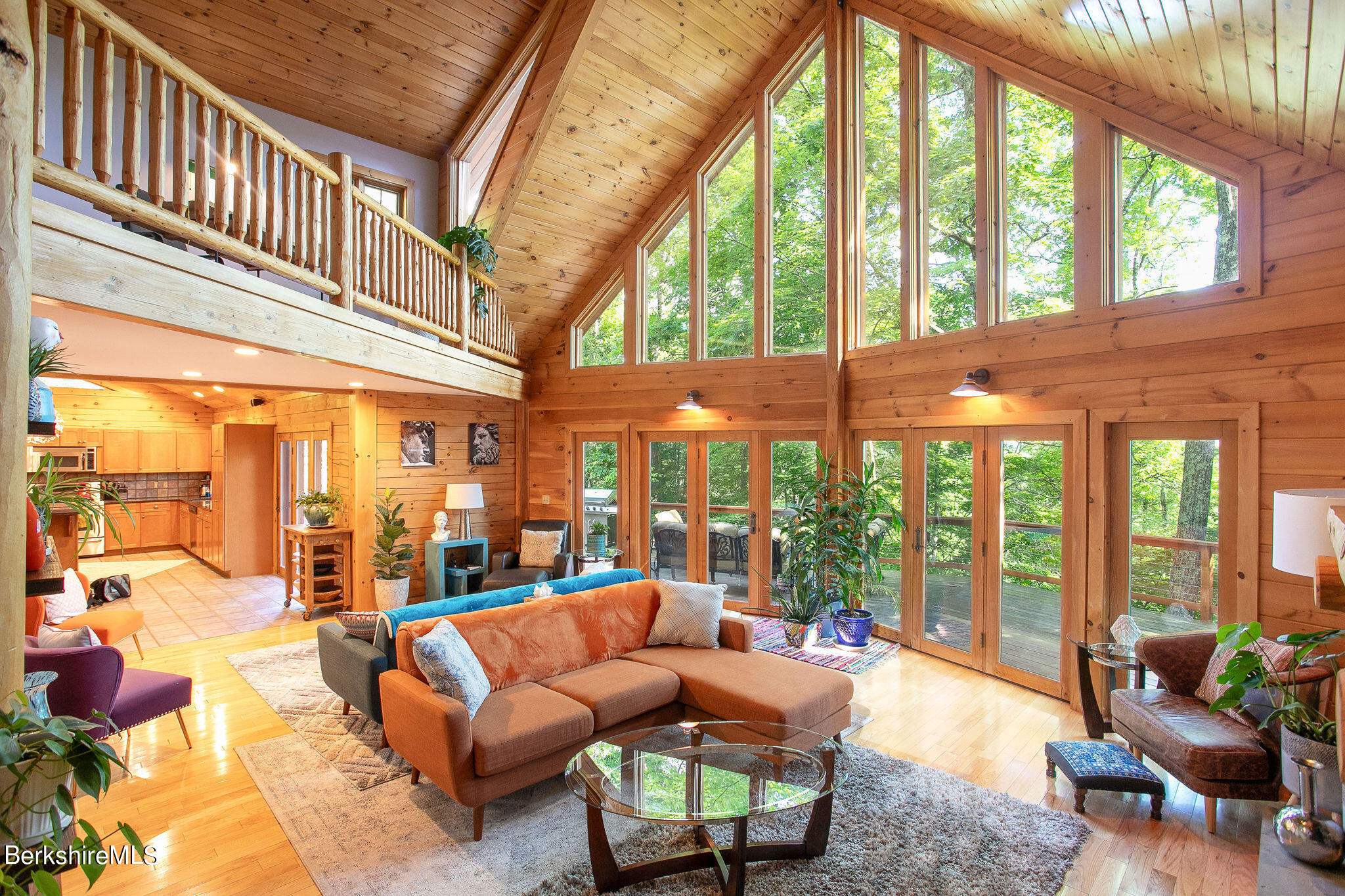 83 Main Road Monterey, MA 01230 - Photo 5 of 49 a living room with furniture and floor to ceiling windows