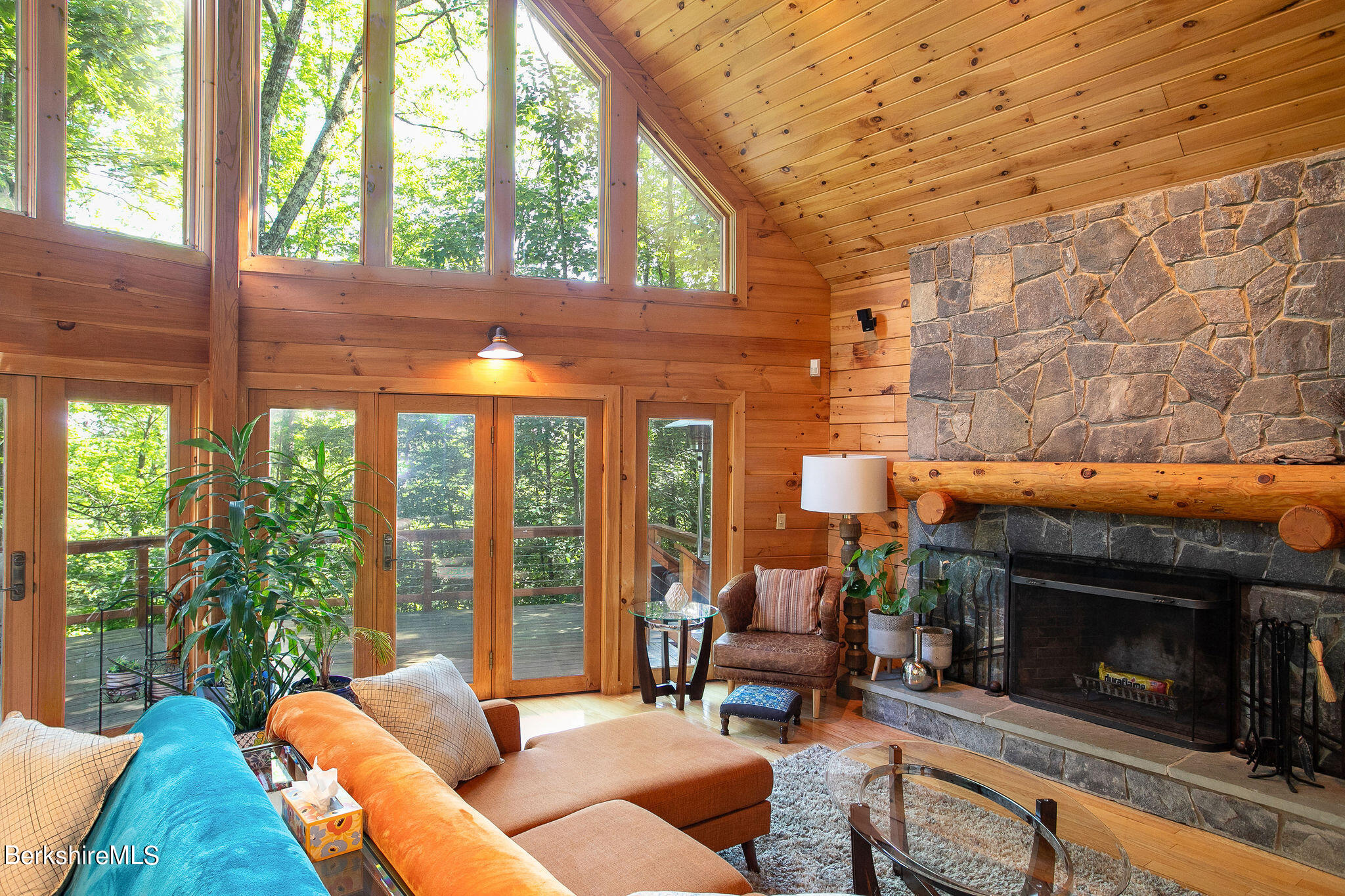 83 Main Road Monterey, MA 01230 - Photo 6 of 49 a outdoor living space with patio furniture and a fireplace