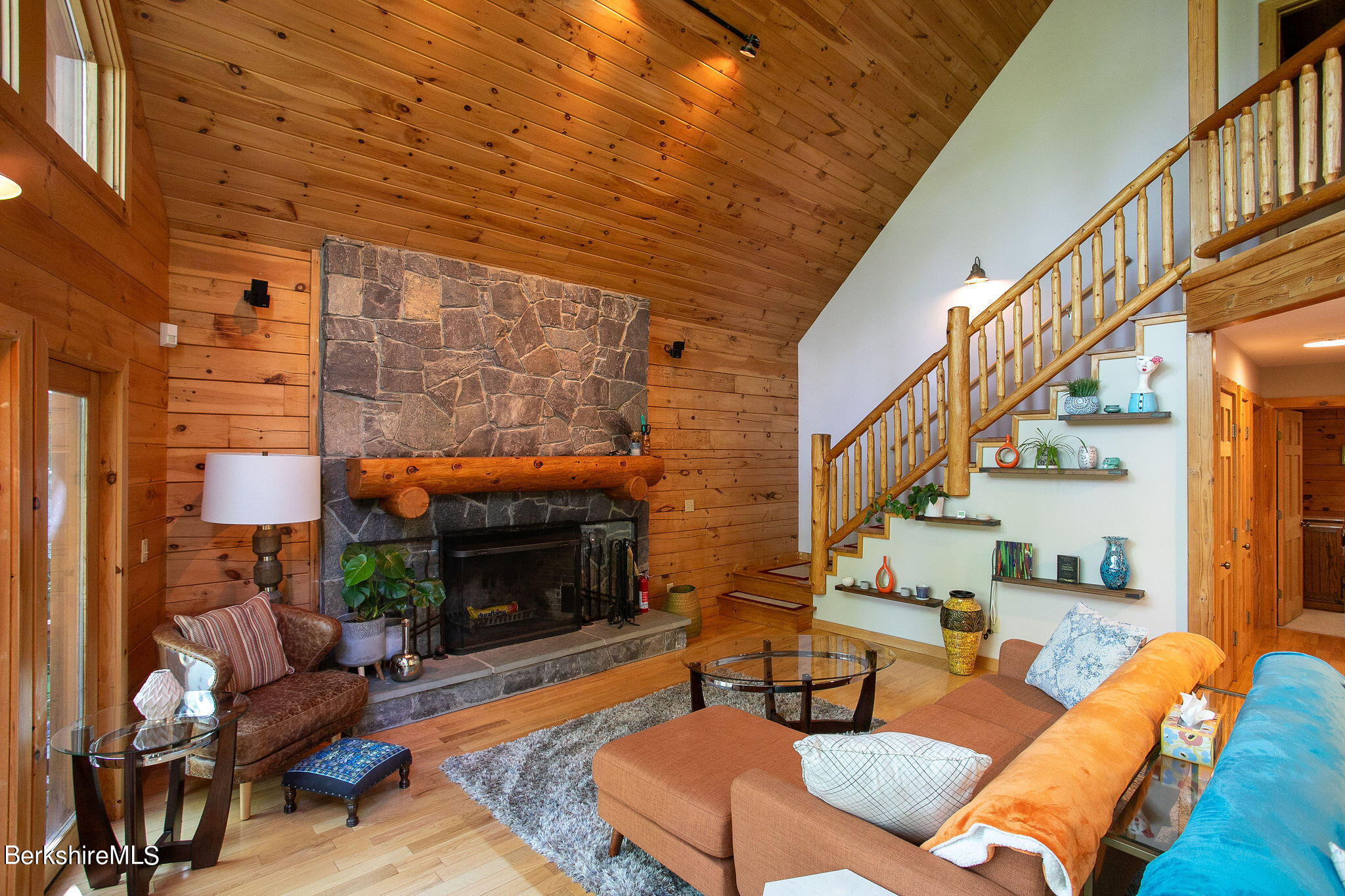 83 Main Road Monterey, MA 01230 - Photo 7 of 49 a outdoor living space with patio furniture and a fireplace