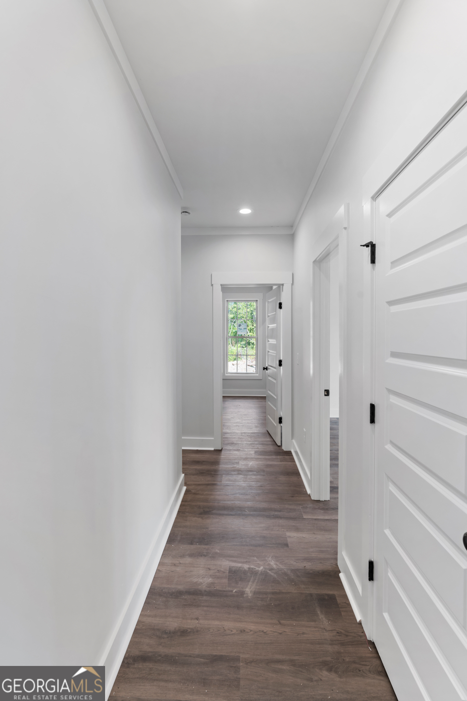 2830 Loch Laurel Road Valdosta, GA 31601 - Photo 13 of 40 a hallway with wooden floor