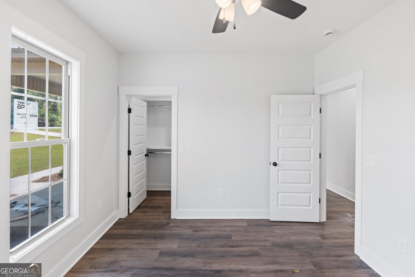 2830 Loch Laurel Road Valdosta, GA 31601 - Photo 14 of 40 a view of an empty room with wooden floor and a window