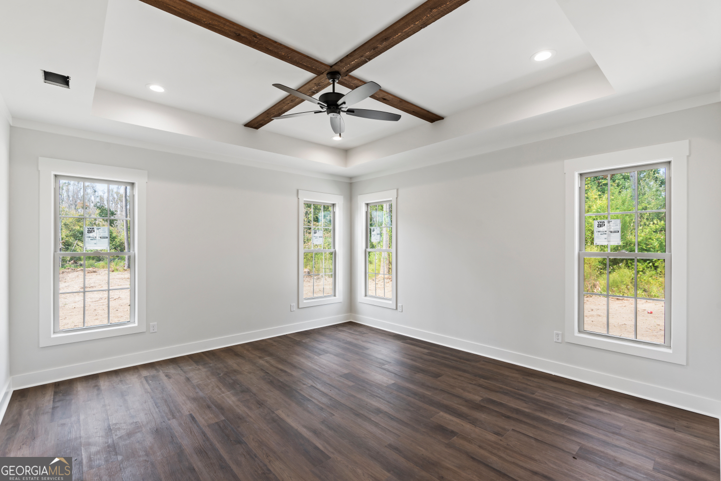 2830 Loch Laurel Road Valdosta, GA 31601 - Photo 19 of 40 a view of an empty room with wooden floor and a window