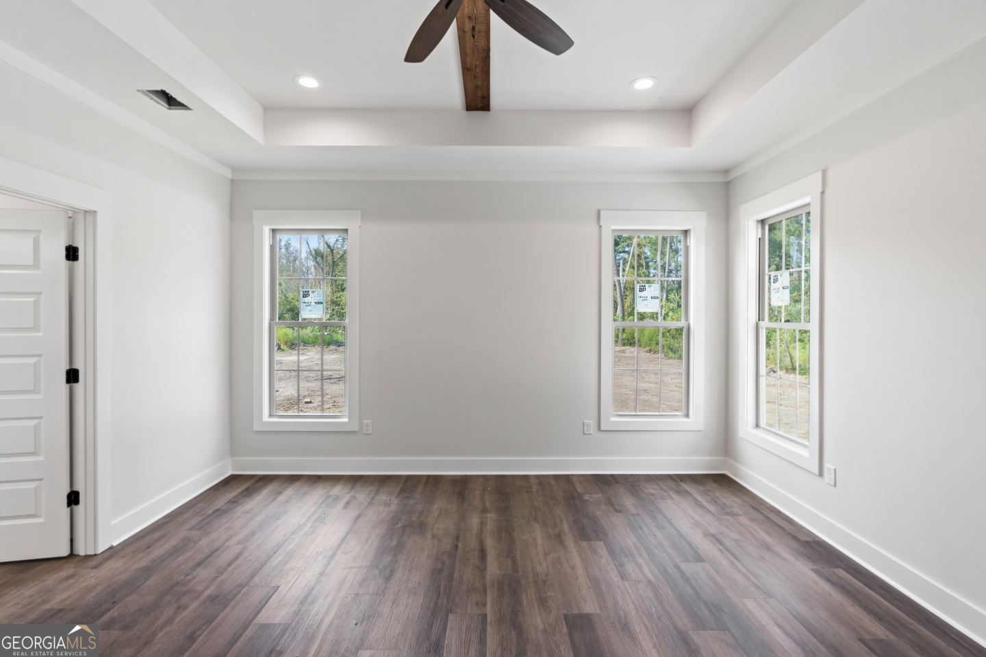 2830 Loch Laurel Road Valdosta, GA 31601 - Photo 20 of 40 a view of an empty room with wooden floor and window