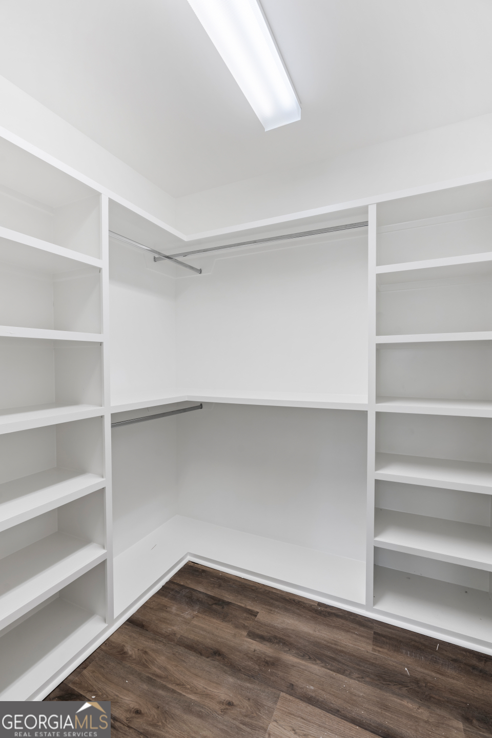 2830 Loch Laurel Road Valdosta, GA 31601 - Photo 22 of 40 a view of a room with shelf on the wall