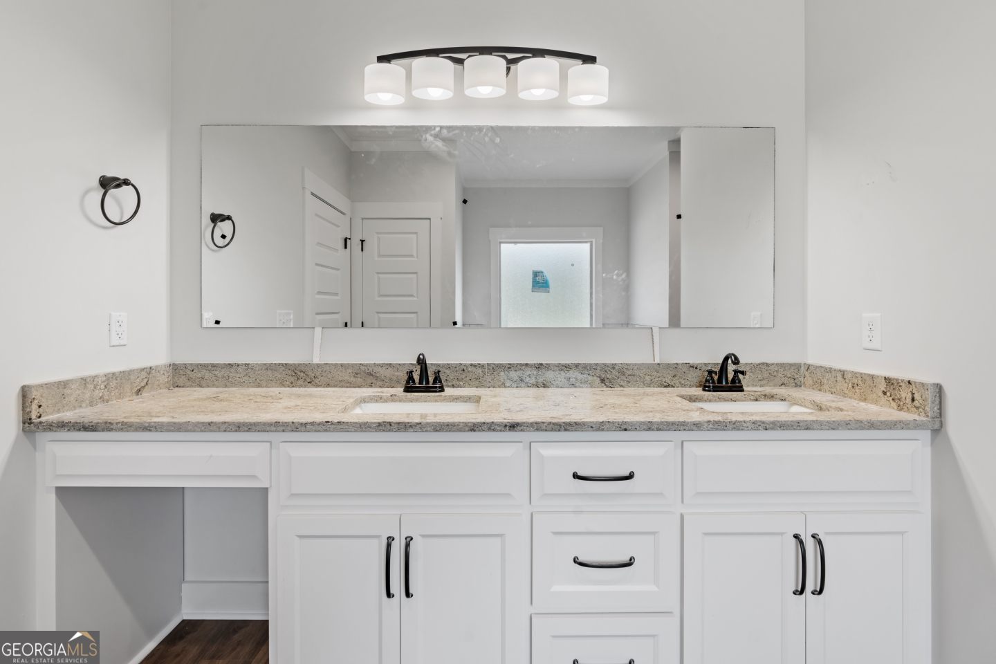 2830 Loch Laurel Road Valdosta, GA 31601 - Photo 28 of 40 a bathroom with a granite countertop sink and a mirror