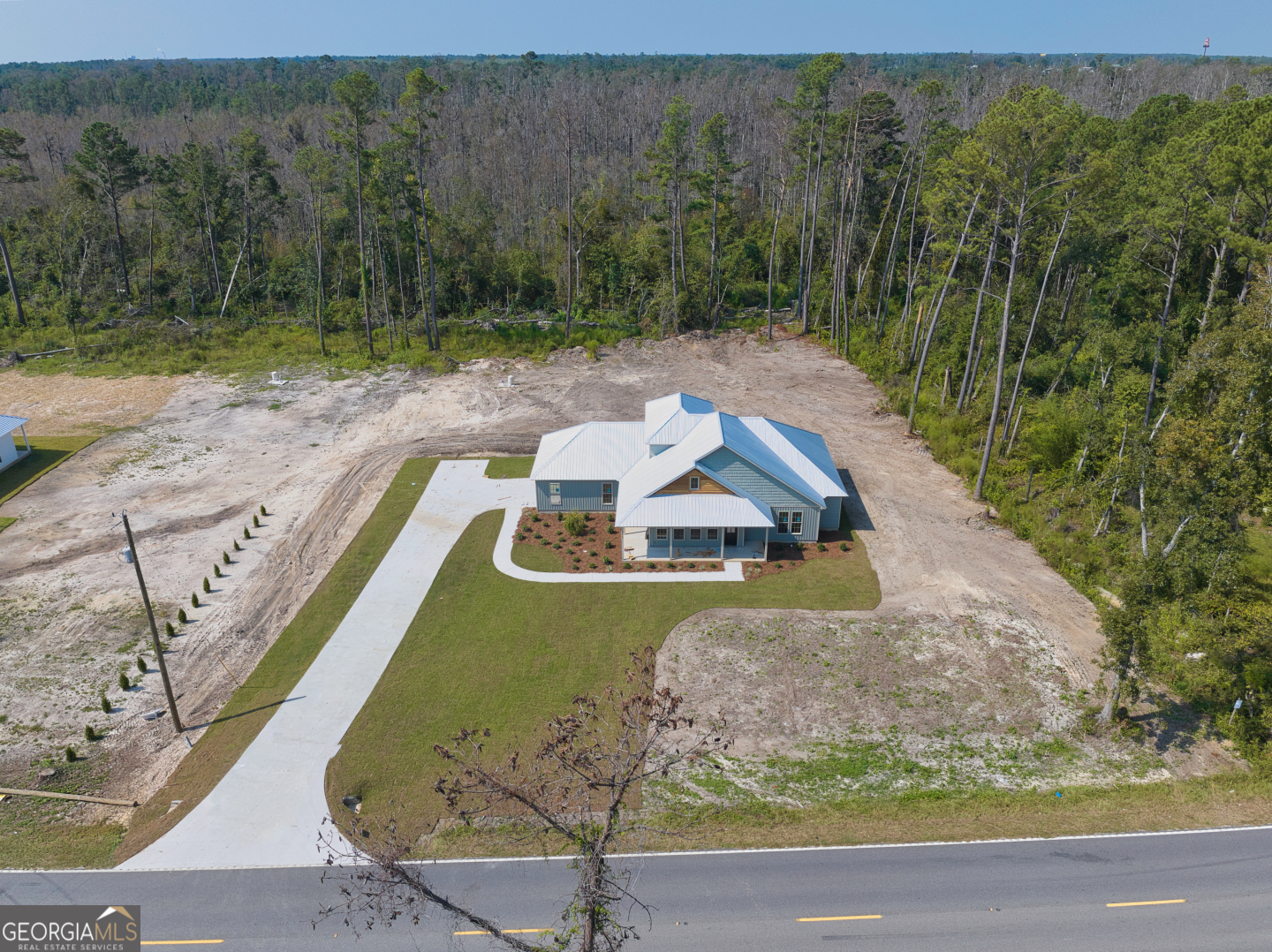2830 Loch Laurel Road Valdosta, GA 31601 - Photo 34 of 40 a view of a house with a yard