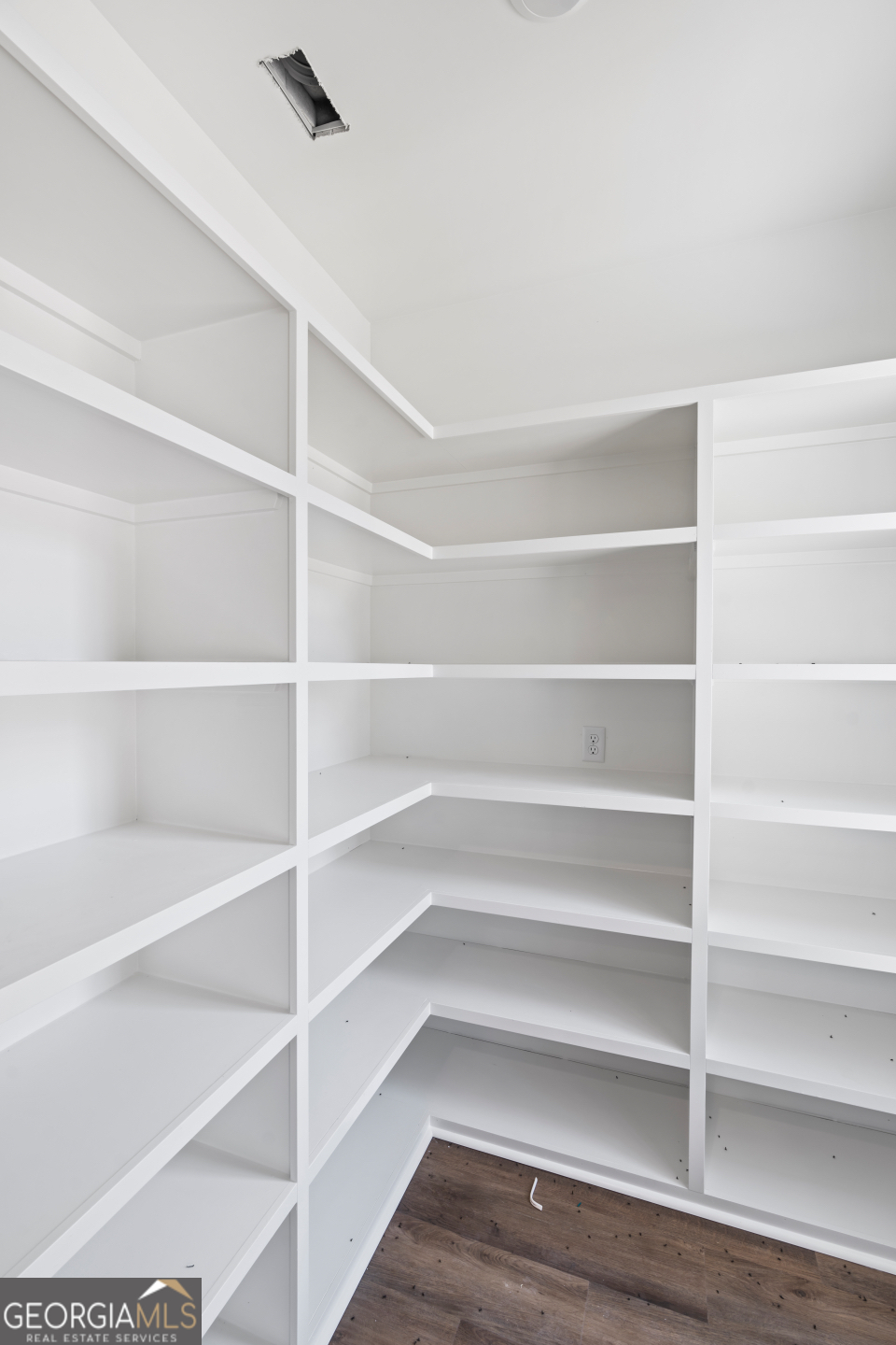 2830 Loch Laurel Road Valdosta, GA 31601 - Photo 5 of 40 a view of walk in closet with empty racks