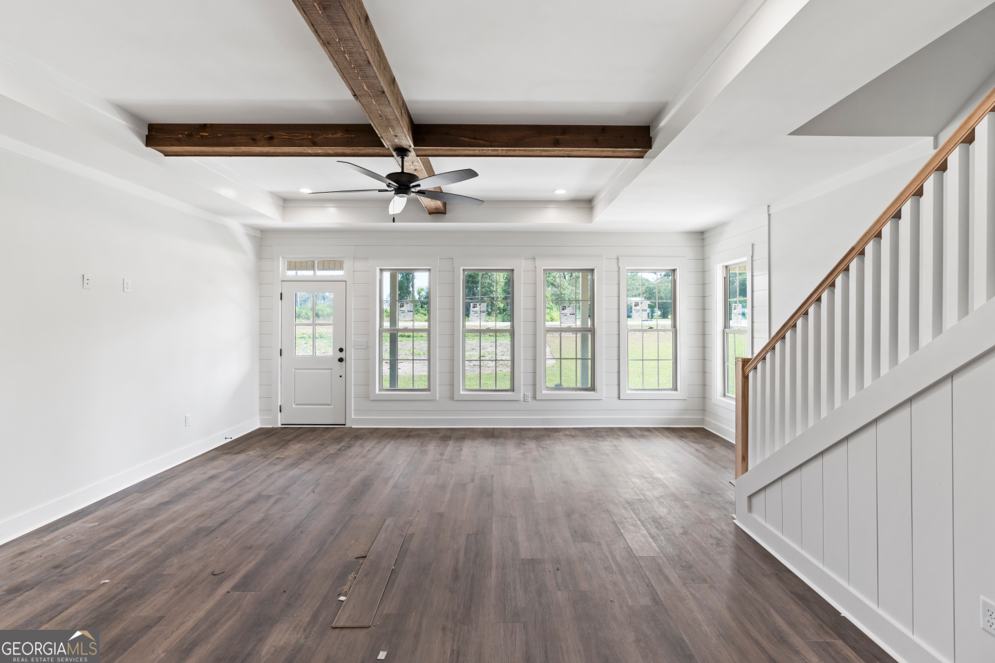 2830 Loch Laurel Road Valdosta, GA 31601 - Photo 8 of 40 a view of an empty room with wooden floor and a window