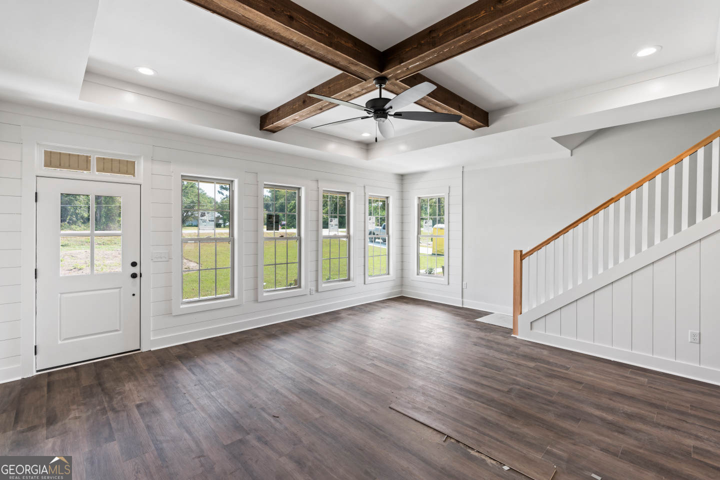 2830 Loch Laurel Road Valdosta, GA 31601 - Photo 9 of 40 a view of an empty room with wooden floor and a window