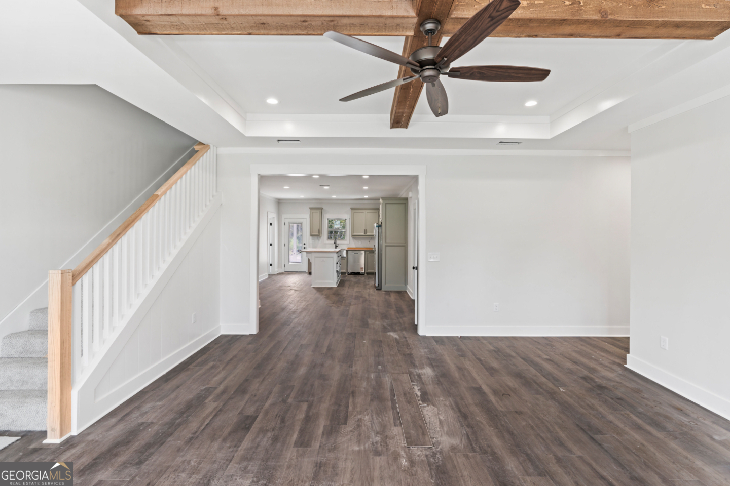 2830 Loch Laurel Road Valdosta, GA 31601 - Photo 10 of 40 a view of a hallway with wooden floor and a ceiling fan