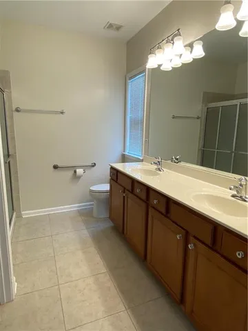 an empty room with a empty space and a ceiling fan