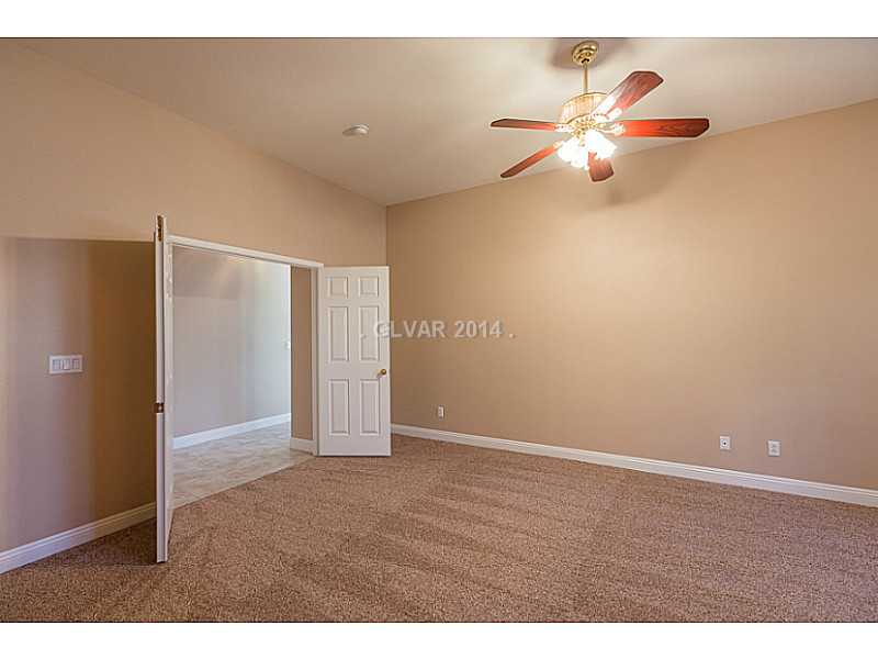 1491 Rancho Ridge Drive Henderson, NV 89012 - Photo 14 of 27 Master Bedroom.