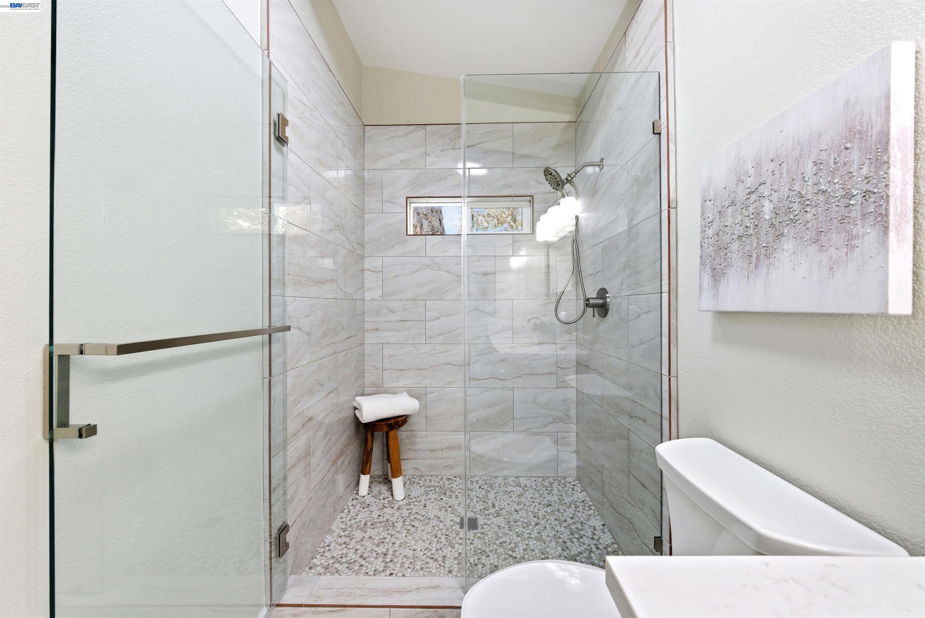 1929 Kilkare Road Sunol, CA 94586 - Photo 19 of 24 a bathroom with a shower and a toilet