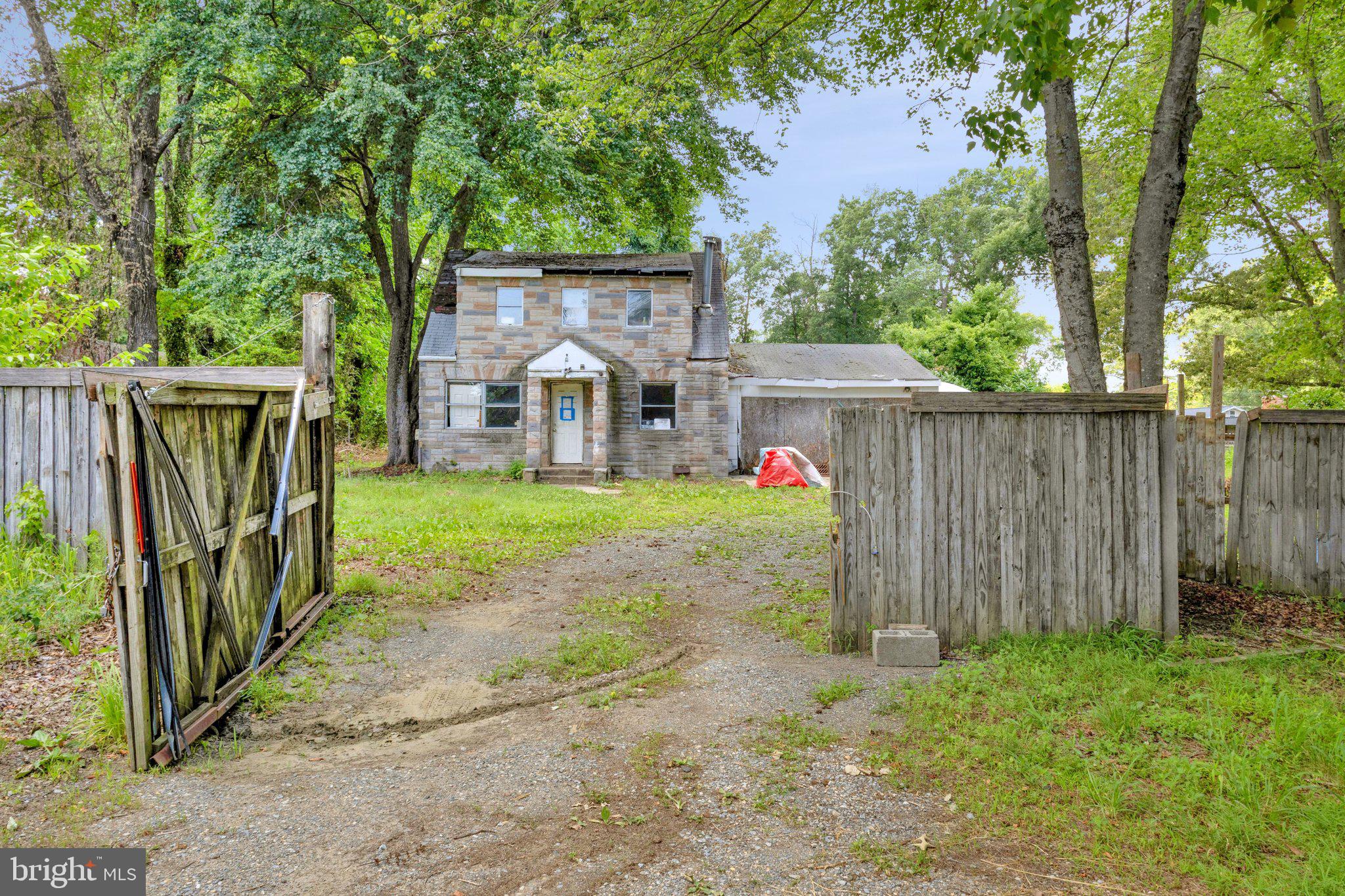 3424-3422 Pike Ridge Road Edgewater, MD 21037 - Photo 5 of 17 a view of a house with backyard and tree