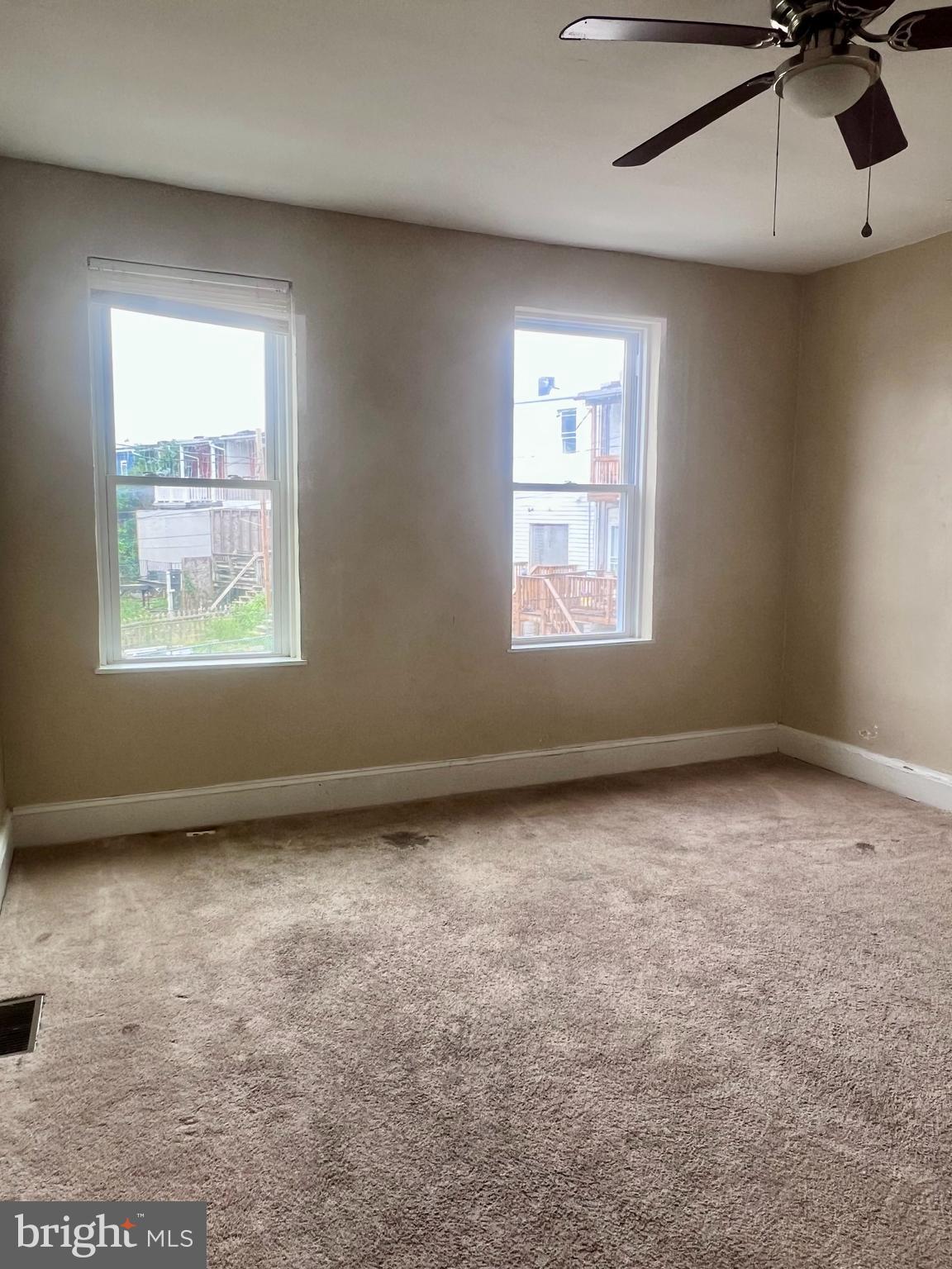 401 South Vincent Street Baltimore, MD 21223 - Photo 8 of 10 a view of an empty room with a window