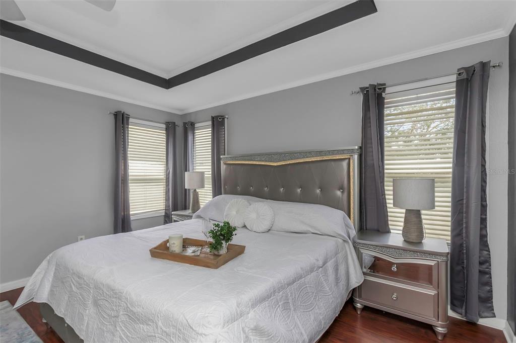 14818 Edgemere Drive Spring Hill, FL 34609 - Photo 18 of 72 a bedroom with a bed and window