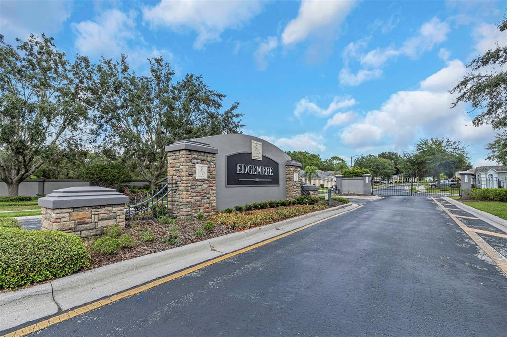 14818 Edgemere Drive Spring Hill, FL 34609 - Photo 3 of 72 a view of a road with a street