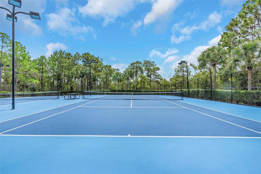 14818 Edgemere Drive Spring Hill, FL 34609 - Photo 69 of 72 a view of a tennis court