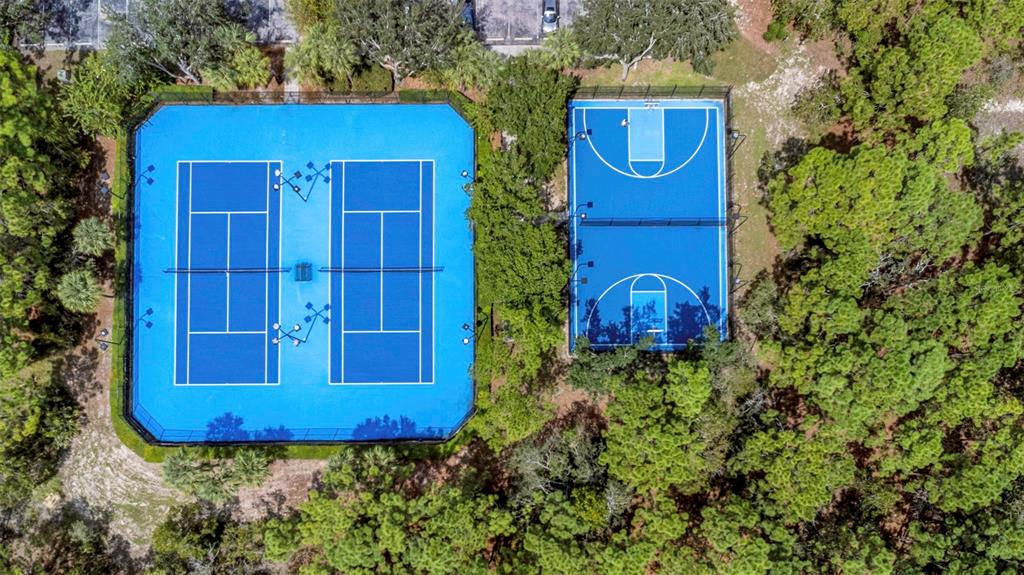 14818 Edgemere Drive Spring Hill, FL 34609 - Photo 71 of 72 a view of a bench in front of a house