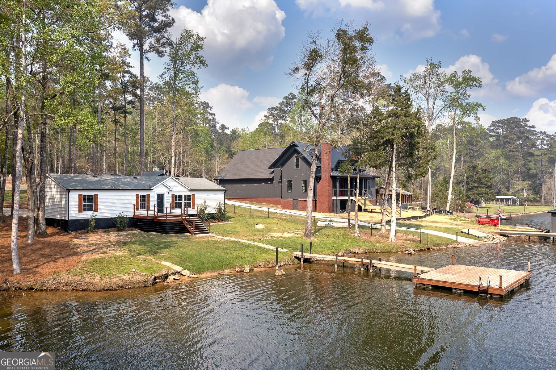 595 Barnetts Bridge Road Jackson, GA 30233 - Photo 2 of 47 a view of a house with swimming pool and sitting area
