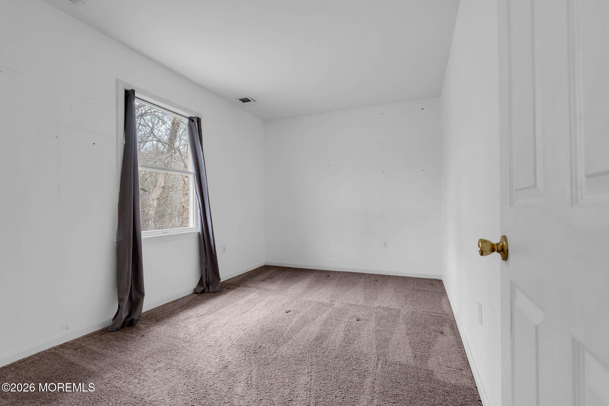 9 Forecastle Way Waretown, NJ 08758 - Photo 32 of 51 a view of an empty room with a window