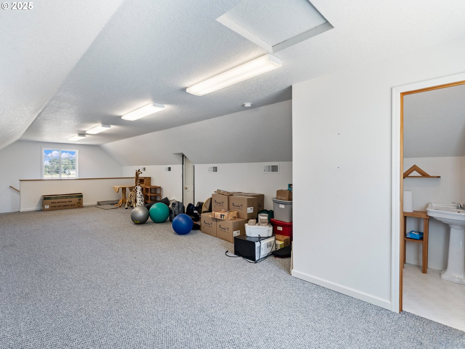 24700 Southwest Rogers Road Sheridan, OR 97378 - Photo 29 of 48 a view of a livingroom with furniture and toys