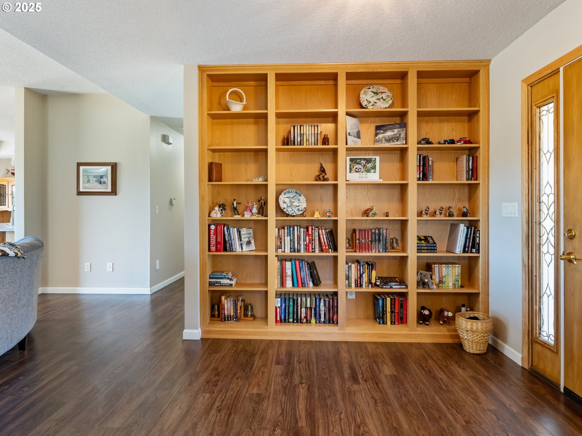 24700 Southwest Rogers Road Sheridan, OR 97378 - Photo 7 of 48 a room with bookshelf and a wooden floor