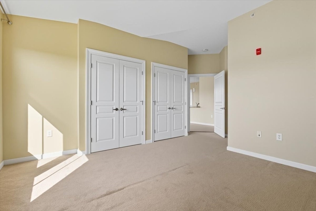 4 Repton Place, Unit 4410 Watertown, MA 02472 - Photo 18 of 41 a view of an empty room