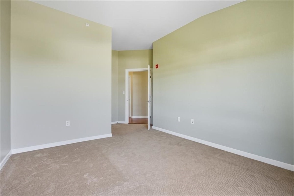 4 Repton Place, Unit 4410 Watertown, MA 02472 - Photo 22 of 41 a view of an empty room