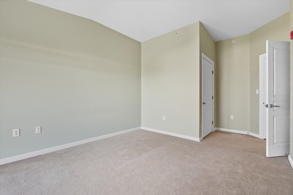 4 Repton Place, Unit 4410 Watertown, MA 02472 - Photo 23 of 41 a view of an empty room