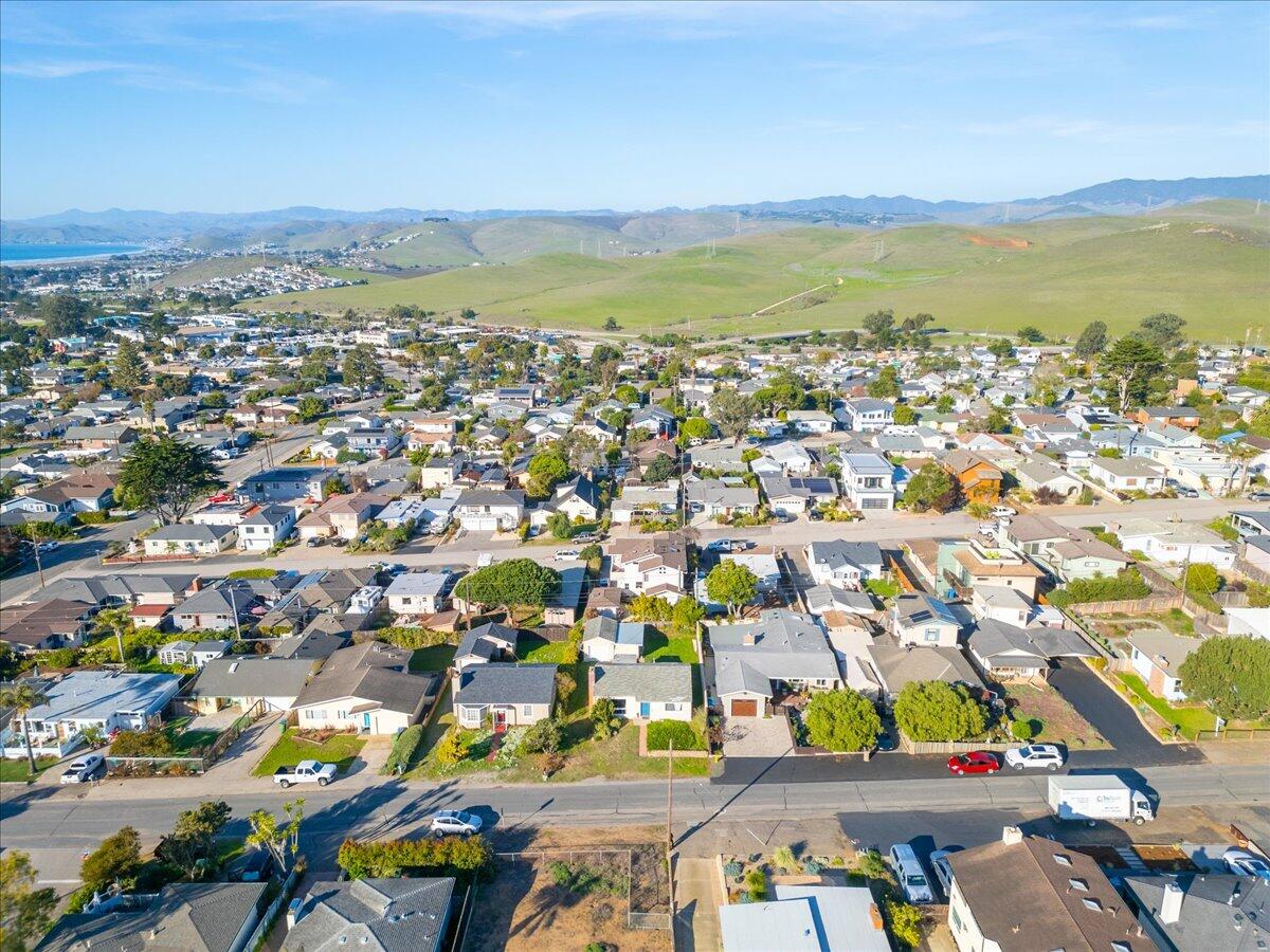 925 Pecho Street Morro Bay, CA 93442 - Photo 38 of 54 an aerial view of residential building and ocean