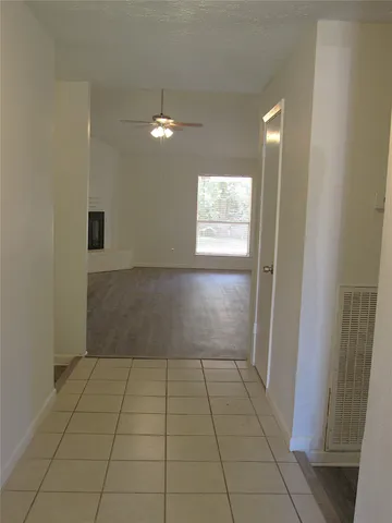 a view of an empty room and window