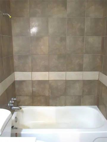 a bathroom with a bathtub