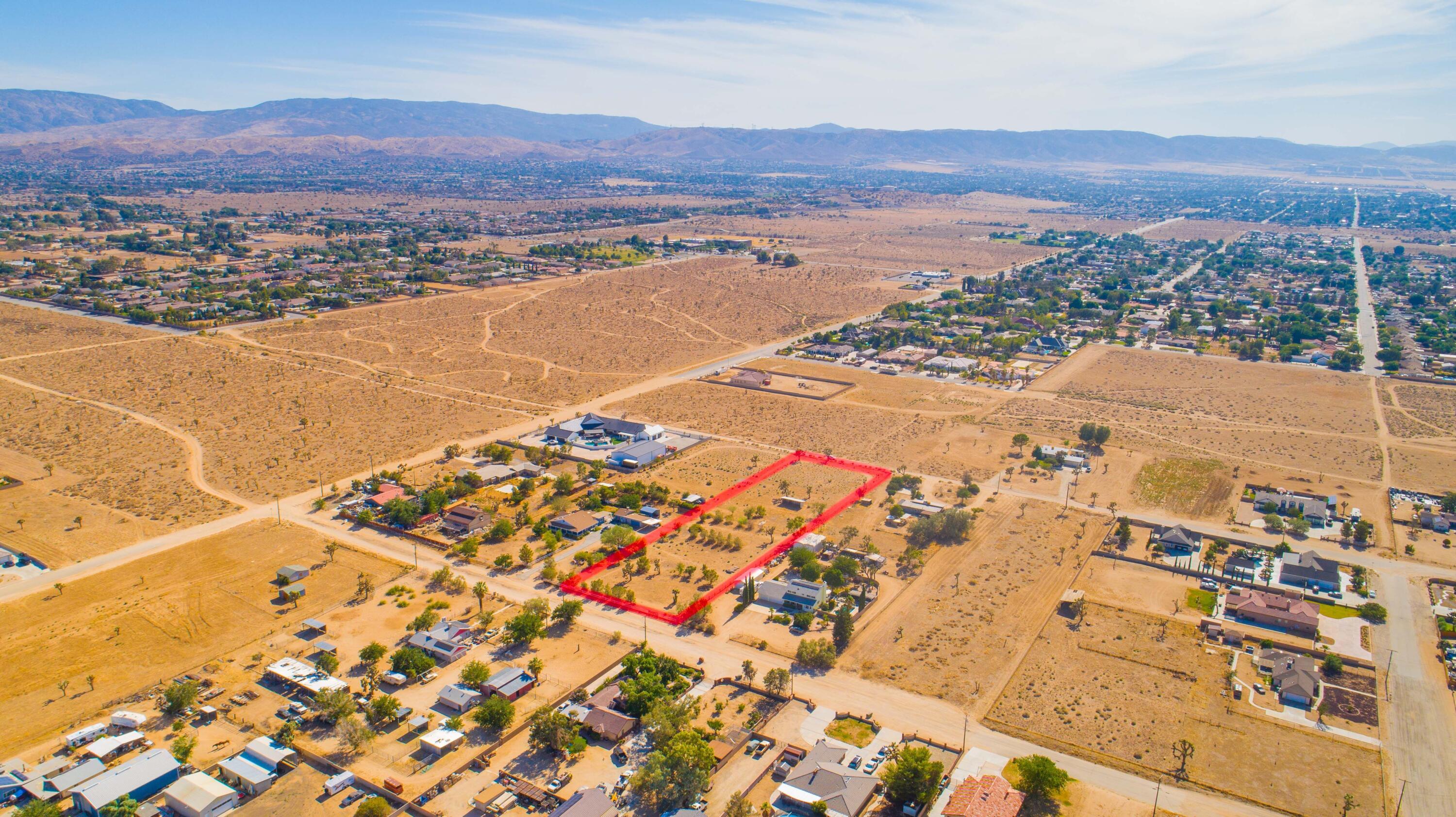 23rd Street Lancaster, CA 93536 - Photo 3 of 4 an aerial view of residential house and sandy dunes