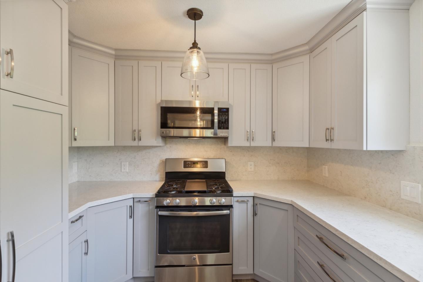 24895 Skyland Road Los Gatos, CA 95033 - Photo 16 of 113 a kitchen with cabinets stainless steel appliances and a counter space