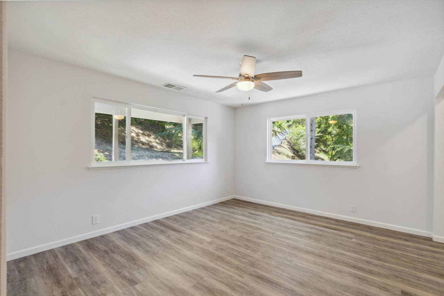 24895 Skyland Road Los Gatos, CA 95033 - Photo 27 of 113 a view of an empty room with a window