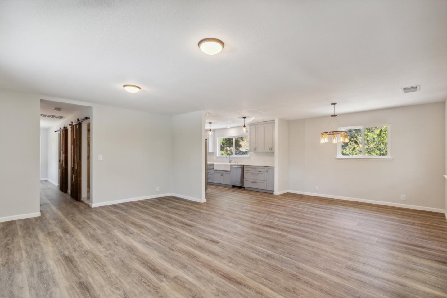 24895 Skyland Road Los Gatos, CA 95033 - Photo 7 of 113 a view of an empty room with a window