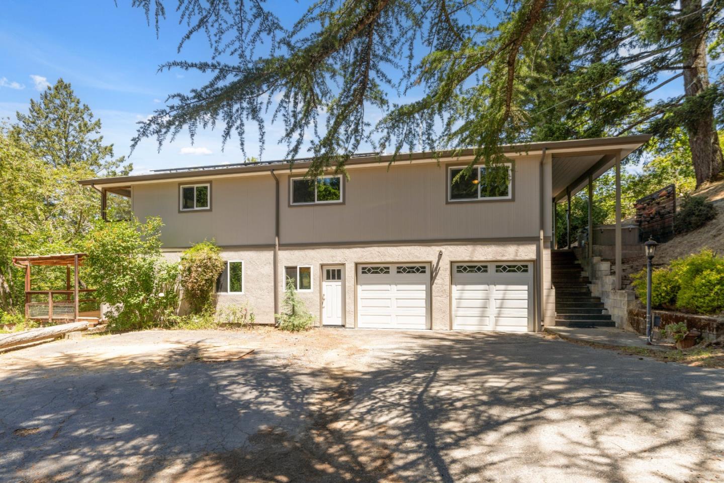 24895 Skyland Road Los Gatos, CA 95033 - Photo 75 of 113 front view of a house with a street