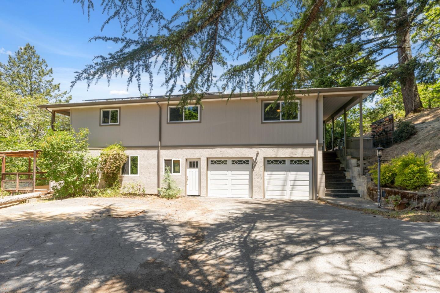 24895 Skyland Road Los Gatos, CA 95033 - Photo 76 of 113 front view of a house with a trees