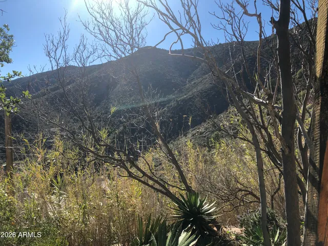 a close view of a utility room with dryer and washer