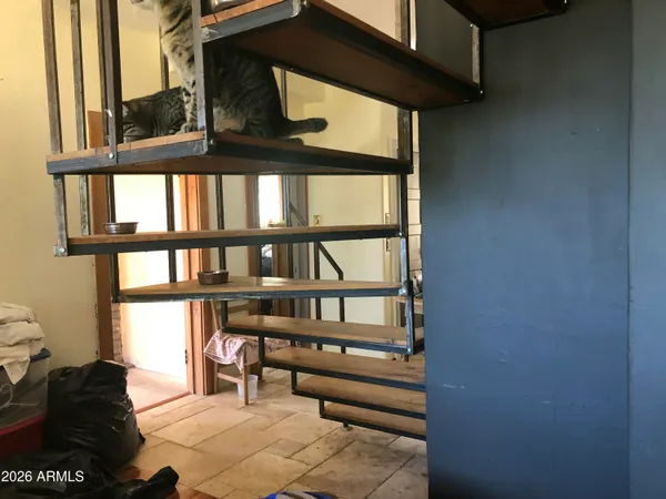 a view of a room that has a large window